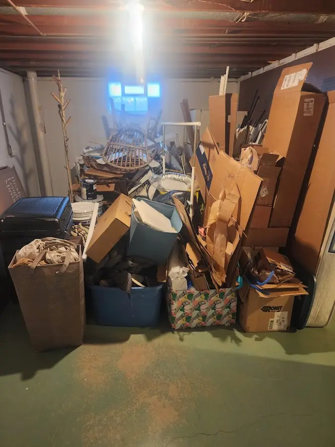 Roll-off dumpster container at job site for 2 Yard Dumpster Rental in Buckhead